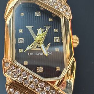 Louis Vuitton Gold and Black Watch with lab diamonds